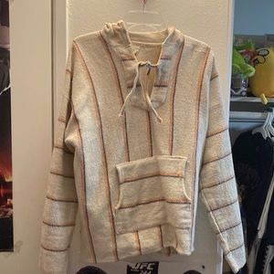 White orange and purple stripped Baja sweater